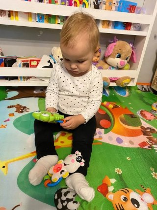 Luxma GRZECHOTKA SENSORYCZNA ŻABKA MELODYJKI ŚWIATŁA 80